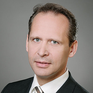 Dr.  Dirk Pensky