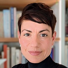 Dr.  Emily Eiben